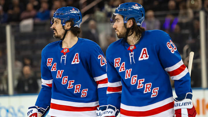 Mar 22, 2025; New York, New York, USA; New York Rangers left wing Chris Kreider (20) and center Mika Zibanejad (93) skate against the Vancouver Canucks  during the third period at Madison Square Garden. Mandatory Credit: Danny Wild-Imagn Images
