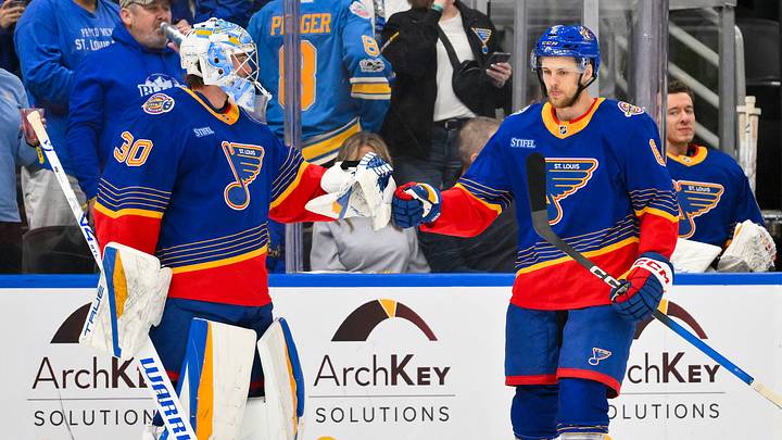 Mar 10, 2026; St. Louis, Missouri, USA; St. Louis Blues defenseman Philip Broberg (6) is congratulated by goaltender Joel Hofer (30) after scoring against the New York Islanders during the first period at Enterprise Center. Mandatory Credit: Jeff Curry-Imagn Images