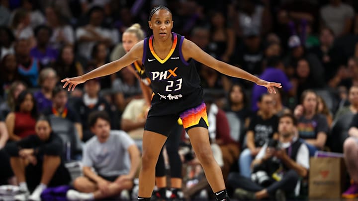 Sep 9, 2025; Phoenix, Arizona, USA; Phoenix Mercury guard Kiana Williams (23) against the Los Angeles Sparks during a WNBA game at PHX Arena. Mandatory Credit: Mark J. Rebilas-Imagn Images