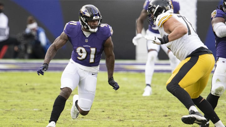 Nov 1, 2020; Baltimore, Maryland, USA; Baltimore Ravens defensive end Yannick Ngakoue (91) rushes during the second half as Pittsburgh Steelers offensive tackle Alejandro Villanueva (78) blocks at M&T Bank Stadium. Mandatory Credit: Tommy Gilligan-Imagn Images