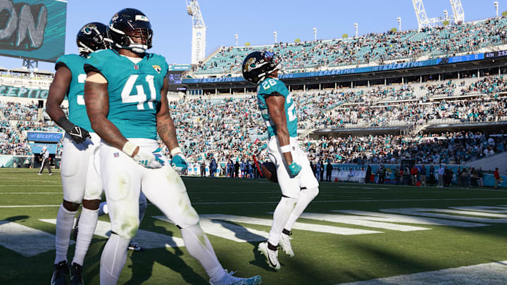Dec 31, 2023; Jacksonville, Florida, USA;  Jacksonville Jaguars safety Antonio Johnson (26) and