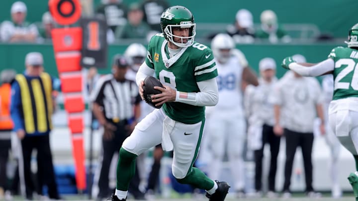 Nov 17, 2024; East Rutherford, New Jersey, USA; New York Jets quarterback Aaron Rodgers (8) drops back to pass against the Indianapolis Colts during the first quarter at MetLife Stadium. Mandatory Credit: Brad Penner-Imagn Images
