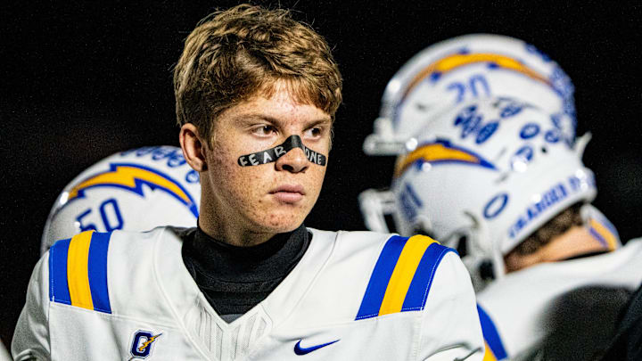 Oxford quarterback Knox Kiffin (13) walks out of a huddle during a high school football game between Murrah and Oxford at Hughes Field in Jackson, Miss., on Thursday, Oct. 30, 2025.