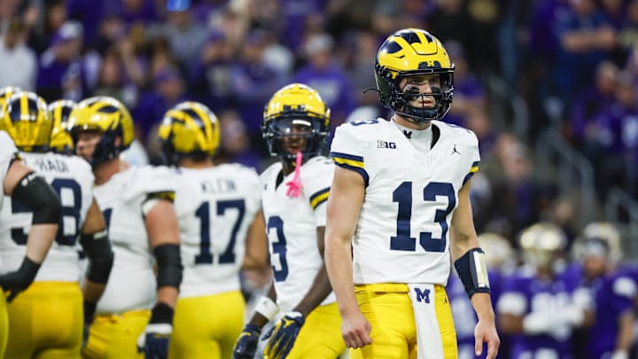 Oct 5, 2024; Seattle, Washington, USA; Michigan Wolverines quarterback Jack Tuttle (13) waits for a play to come in against the Washington Huskies during the third quarter at Alaska Airlines Field at Husky Stadium. Mandatory Credit: Joe Nicholson-Imagn Images