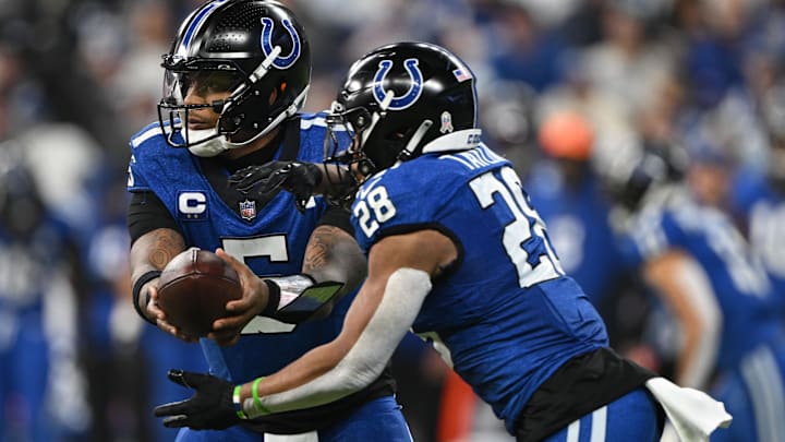 Nov 24, 2024; Indianapolis, Indiana, USA; Indianapolis Colts quarterback Anthony Richardson (5) hands the ball off to Indianapolis Colts running back Jonathan Taylor (28) during the second quarter against the Detroit Lions at Lucas Oil Stadium. Mandatory Credit: Marc Lebryk-Imagn Images Nov 24, 2024; Indianapolis, Indiana, USA; Indianapolis Colts quarterback Anthony Richardson (5) hands the ball off to Indianapolis Colts running back Jonathan Taylor (28) during the second quarter against the Detroit Lions at Lucas Oil Stadium. Mandatory Credit: Marc Lebryk-Imagn Images
