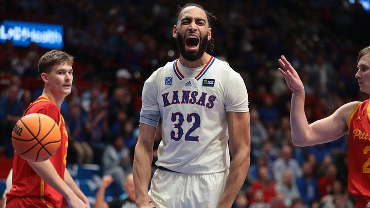 Kansas Jayhawks center Christian Reeves (32) reacts after making a basket against Pittsburg State Gorillas during the game inside Allen Fieldhouse on Oct. 16, 2026. Kansas Jayhawks center Christian Reeves (32) reacts after making a basket against Pittsburg State Gorillas during the game inside Allen Fieldhouse on Oct. 16, 2026.