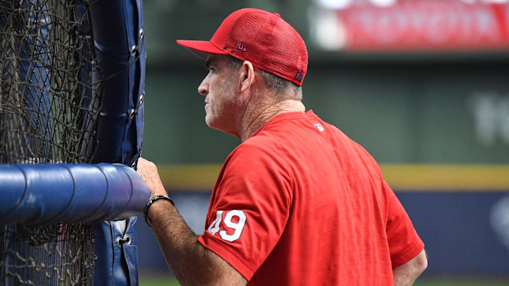Apr 8, 2023; Milwaukee, Wisconsin, USA; St. Louis Cardinals hitting coach Turner Ward (49) watches St. Louis Cardinals center fielder Tyler O'Neill (27) take batting practice before their game against Milwaukee Brewers at American Family Field. Mandatory Credit: Michael McLoone-Imagn Images
