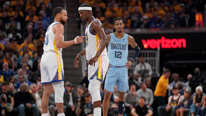 Apr 15, 2025; San Francisco, California, USA; Golden State Warriors guard Stephen Curry (30) talks with forward Jimmy Butler III (10) during a break in the action against the Memphis Grizzlies in the second quarter at the Chase Center. Mandatory Credit: Cary Edmondson-Imagn Images