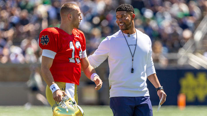 Apr 25, 2026; Notre Dame, IN, USA; Notre Dame Fighting Irish head coach Marcus Freeman talks with quarterback CJ Carr (13) during the Blue-Gold game at Notre Dame Stadium. Mandatory Credit: Michael Caterina-Imagn Images Apr 25, 2026; Notre Dame, IN, USA; Notre Dame Fighting Irish head coach Marcus Freeman talks with quarterback CJ Carr (13) during the Blue-Gold game at Notre Dame Stadium. Mandatory Credit: Michael Caterina-Imagn Images
