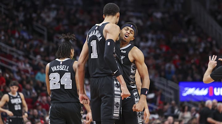 Dec 11, 2023; Houston, Texas, USA; San Antonio Spurs center Victor Wembanyama (1) celebrates with forward Keldon Johnson (3) after scoring a basket during the third quarter against the Houston Rockets at Toyota Center.