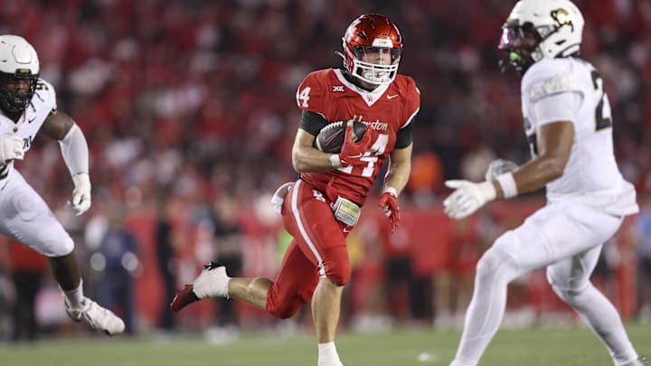 Sep 12, 2025; Houston, Texas, USA; Houston Cougars running back Dean Connors (44) runs with the ball during the third quarter against the Colorado Buffaloes at TDECU Stadium. Mandatory Credit: Troy Taormina-Imagn Images