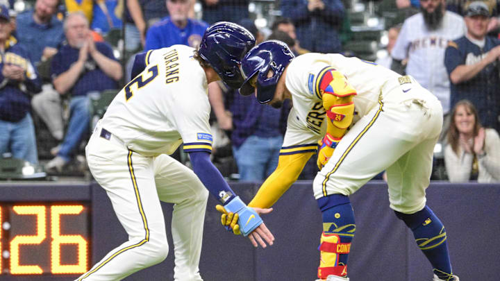 Apr 30, 2026; Milwaukee, Wisconsin, USA;  Milwaukee Brewers catcher William Contreras (24) celebrates with  second baseman Brice Turang (2) after hitting a two run home run in the third inning against the Arizona Diamondbacks at American Family Field. Mandatory Credit: Benny Sieu-Imagn Images