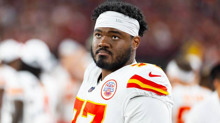 Aug 9, 2025; Glendale, Arizona, USA; Kansas City Chiefs guard Jaylon Moore (77) against the Arizona Cardinals during a preseason NFL game at State Farm Stadium. Mandatory Credit: Mark J. Rebilas-Imagn Images Aug 9, 2025; Glendale, Arizona, USA; Kansas City Chiefs guard Jaylon Moore (77) against the Arizona Cardinals during a preseason NFL game at State Farm Stadium. Mandatory Credit: Mark J. Rebilas-Imagn Images