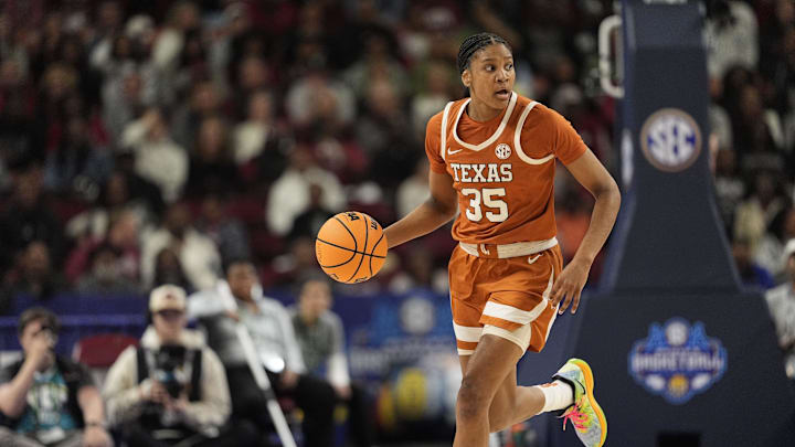 March 9, 2025; Greenville, SC, USA; Texas Longhorns forward Madison Booker (35) brings the ball up court against South Carolina Gamecocks during the first half at Bon Secours Wellness Arena. Mandatory Credit: Jim Dedmon-Imagn Images March 9, 2025; Greenville, SC, USA; Texas Longhorns forward Madison Booker (35) brings the ball up court against South Carolina Gamecocks during the first half at Bon Secours Wellness Arena. Mandatory Credit: Jim Dedmon-Imagn Images