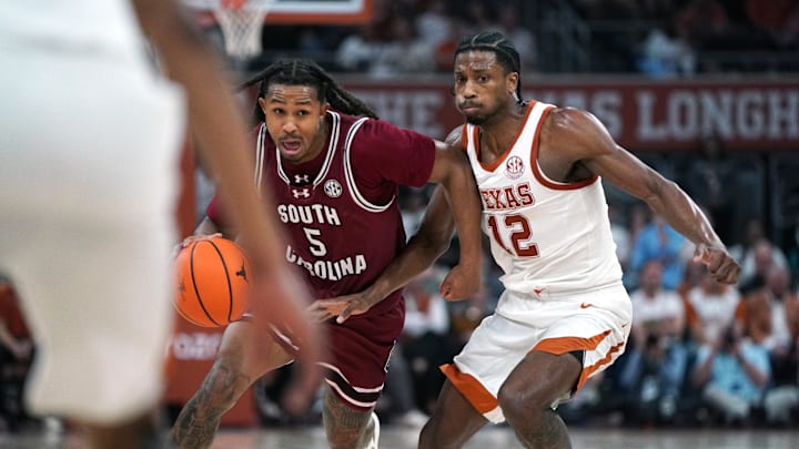 South Carolina Gamecocks guard Meechie Johnson drives the ball to the basket against Texas Longhorns guard Tramon Mark during the second half at Moody Center. 