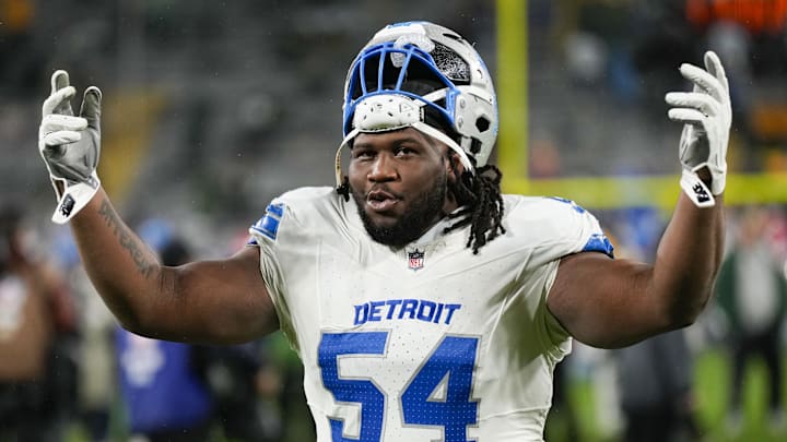 Nov 3, 2024; Green Bay, Wisconsin, USA;  Detroit Lions defensive lineman Alim McNeill (54) celebrates as he runs off the field following the game against the Green Bay Packers at Lambeau Field. Mandatory Credit: Jeff Hanisch-Imagn Images