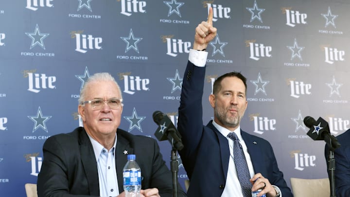 Dallas Cowboys CEO Stephen Jones and head coach Brian Schottenheimer speak to the media at a press conference.