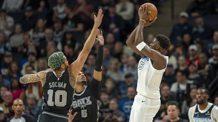 Minnesota Timberwolves guard Anthony Edwards shoots over San Antonio Spurs forward Jeremy Sochan (10) and guard Stephon Castle in the first half at Target Center in Minneapolis on March 9, 2025. Minnesota Timberwolves guard Anthony Edwards shoots over San Antonio Spurs forward Jeremy Sochan (10) and guard Stephon Castle in the first half at Target Center in Minneapolis on March 9, 2025.