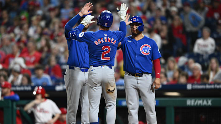 Sep 25, 2024; Philadelphia, Pennsylvania, USA; Chicago Cubs infielder Nico Hoerner (2) celebrates with teammates after hitting a three-run home run against the Philadelphia Phillies in the fourth inning at Citizens Bank Park.