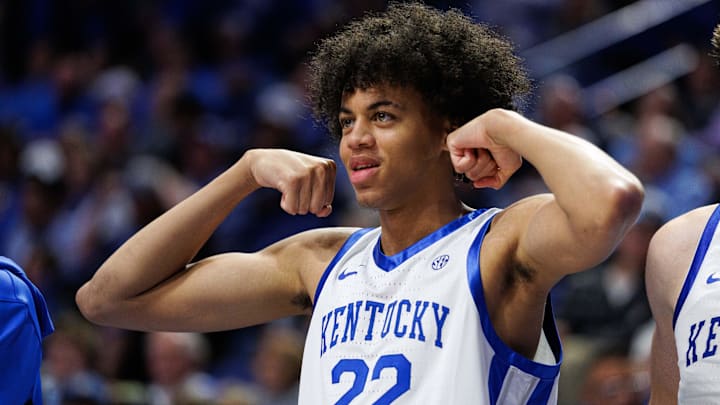 Oct 24, 2025; Lexington, KY, USA; Kentucky Wildcats forward Braydon Hawthorne (22) gestures in celebration from the bench during the second half against the Purdue Boilermakers at Rupp Arena at Central Bank Center. Mandatory Credit: Jordan Prather-Imagn Images