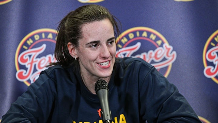 May 4, 2025; Iowa City, IA, USA; Indiana Fever guard Caitlin Clark (22) answers questions before the preseason game against the Brazil National Team at Carver-Haweye Arena.  Mandatory Credit: Jeffrey Becker-Imagn Images