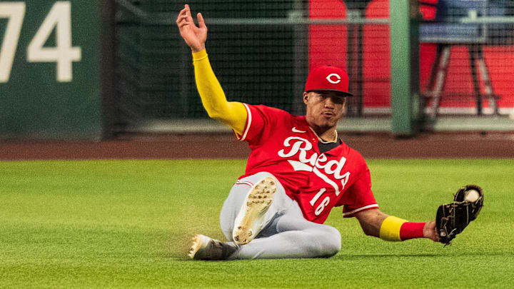 Aug 23, 2025; Phoenix, Arizona, USA; Cincinnati Reds infielder Noelvi Marte (16) reacts after sliding to catch a deep ball to right field in the first inning against the Arizona Diamondbacks at Chase Field. Mandatory Credit: Allan Henry-Imagn Images