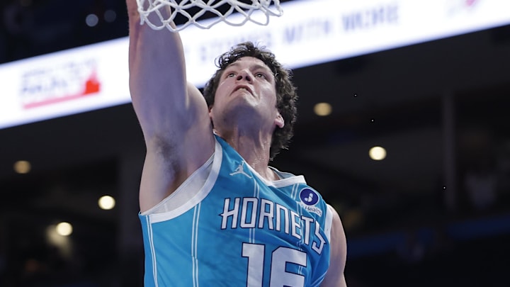 Jan 5, 2026; Oklahoma City, Oklahoma, USA; Charlotte Hornets center PJ Hall (16) dunks against the Oklahoma City Thunder during the second half at Paycom Center. Mandatory Credit: Alonzo Adams-Imagn Images