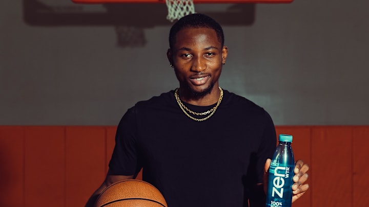 Golden State Warriors forward Jonathan Kuminga with ZEN Wtr Golden State Warriors forward Jonathan Kuminga with ZEN Wtr