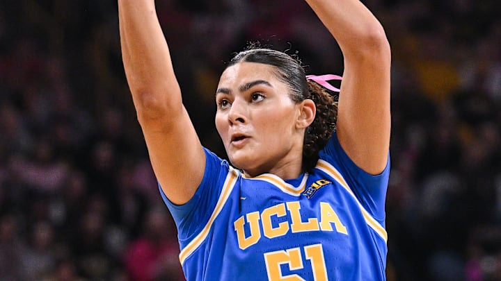 Feb 23, 2025; Iowa City, Iowa, USA; UCLA Bruins center Lauren Betts (51) shoots against the Iowa Hawkeyes during the first quarter at Carver-Hawkeye Arena. Mandatory Credit: Jeffrey Becker-Imagn Images