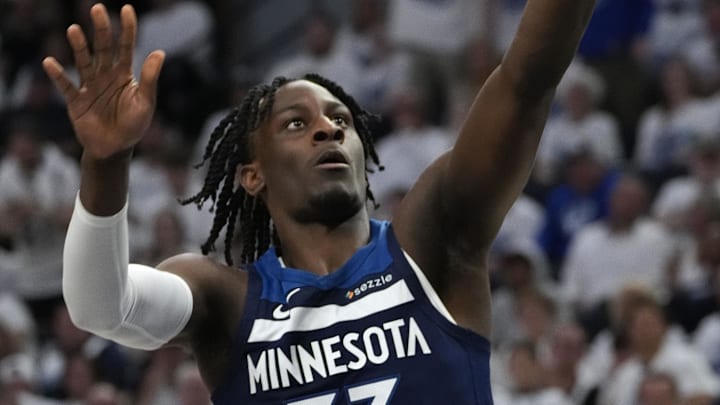 May 24, 2025; Minneapolis, Minnesota, USA; Minnesota Timberwolves forward Leonard Miller (33) shoots the ball against the Oklahoma City Thunder during the second half in game three of the western conference finals for the 2025 NBA Playoffs at Target Center. Mandatory Credit: Bruce Kluckhohn-Imagn Images