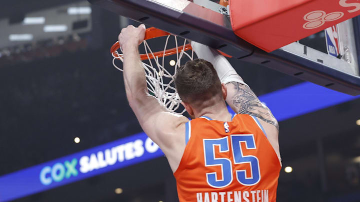 Nov 26, 2025; Oklahoma City, Oklahoma, USA; Oklahoma City Thunder center Isaiah Hartenstein (55) dunks against the Minnesota Timberwolves during the first quarter at Paycom Center. Mandatory Credit: Alonzo Adams-Imagn Images