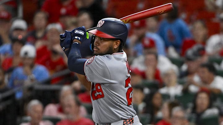 Jul 8, 2025; St. Louis, Missouri, USA;  Washington Nationals left fielder James Wood (29) hits a one run single against the St. Louis Cardinals during the third inning at Busch Stadium.
