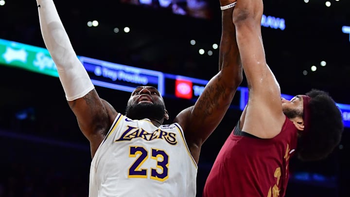 Apr 6, 2024; Los Angeles, California, USA; Los Angeles Lakers forward LeBron James (23) moves to the basket against Cleveland Cavaliers center Jarrett Allen (31) during the second half at Crypto.com Arena. Mandatory Credit: Gary A. Vasquez-Imagn Images Apr 6, 2024; Los Angeles, California, USA; Los Angeles Lakers forward LeBron James (23) moves to the basket against Cleveland Cavaliers center Jarrett Allen (31) during the second half at Crypto.com Arena. Mandatory Credit: Gary A. Vasquez-Imagn Images