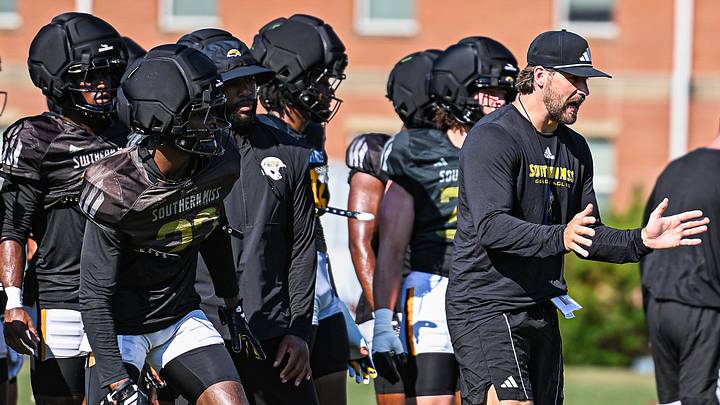 Southern Miss defensive coordinator Joe Bolden gives directions to the defensive backs during Saturday’s fall camp practice. Southern Miss defensive coordinator Joe Bolden gives directions to the defensive backs during Saturday’s fall camp practice.
