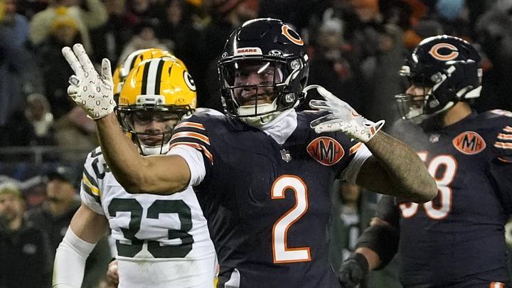 Jan 10, 2026; Chicago, IL, USA; Chicago Bears wide receiver DJ Moore (2) reacts after making a first down catch against the Green Bay Packers during the first half of an NFC Wild Card Round game at Soldier Field. Jan 10, 2026; Chicago, IL, USA; Chicago Bears wide receiver DJ Moore (2) reacts after making a first down catch against the Green Bay Packers during the first half of an NFC Wild Card Round game at Soldier Field.