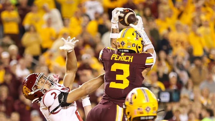 Oct 5, 2024; Minneapolis, Minnesota, USA; Minnesota Golden Gophers defensive back Koi Perich (3) intercepts a pass during the second half against the USC Trojans at Huntington Bank Stadium. Mandatory Credit: Matt Krohn-Imagn Images Oct 5, 2024; Minneapolis, Minnesota, USA; Minnesota Golden Gophers defensive back Koi Perich (3) intercepts a pass during the second half against the USC Trojans at Huntington Bank Stadium. Mandatory Credit: Matt Krohn-Imagn Images