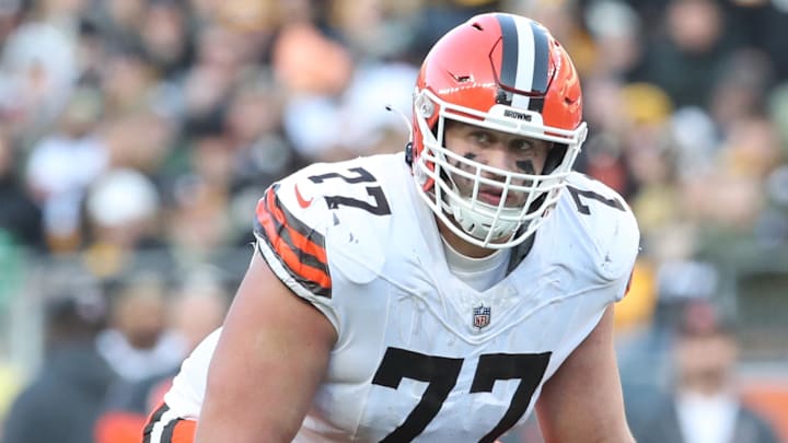 Dec 8, 2024; Pittsburgh, Pennsylvania, USA;  Cleveland Browns guard Wyatt Teller (77) at the line of scrimmage against the Pittsburgh Steelers during the fourth quarter at Acrisure Stadium. Mandatory Credit: Charles LeClaire-Imagn Images