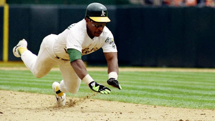 Rickey Henderson diving into third base for his record breaking steal. It was announced that Henderson passed away earlier today at the age of 65 