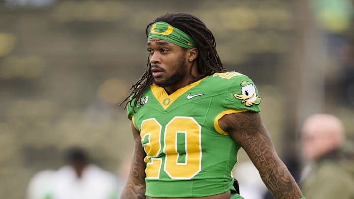 Nov 9, 2024; Eugene, Oregon, USA; Oregon Ducks running back Jordan James (20) warms up before a game against the Maryland Terrapins at Autzen Stadium.