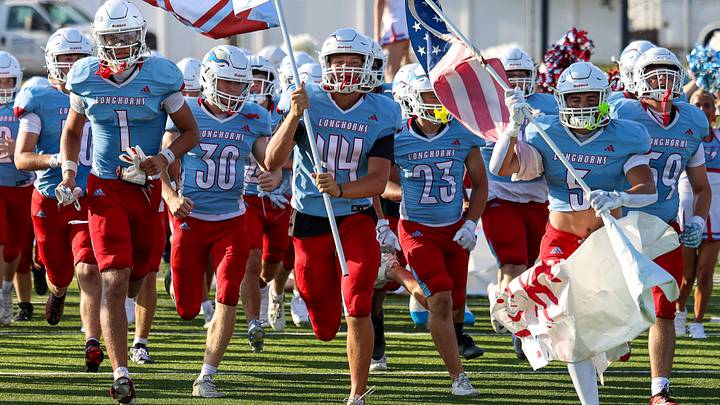 Parkway West football team runs out for its season opener against Parkway North on Thursday, Aug. 27, 2026.