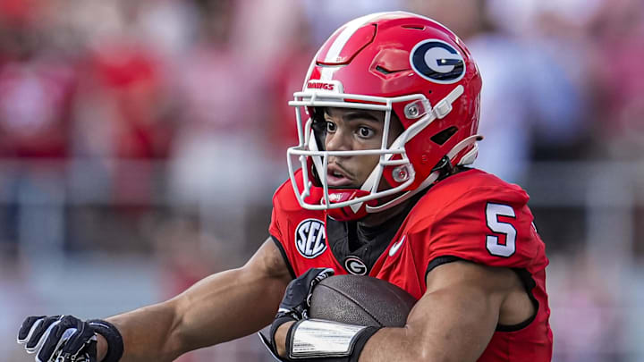Nov 22, 2025; Athens, Georgia, USA; Georgia Bulldogs wide receiver Noah Thomas (5) runs with the ball against the Charlotte 49ers during the first half at Sanford Stadium. Mandatory Credit: Dale Zanine-Imagn Images