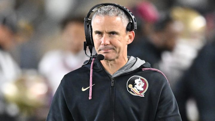 Nov 9, 2024; South Bend, Indiana, USA; Florida State Seminoles head coach Mike Norvell watches in the third quarter against the Notre Dame Fighting Irish at Notre Dame Stadium. Mandatory Credit: Matt Cashore-Imagn Images Nov 9, 2024; South Bend, Indiana, USA; Florida State Seminoles head coach Mike Norvell watches in the third quarter against the Notre Dame Fighting Irish at Notre Dame Stadium. Mandatory Credit: Matt Cashore-Imagn Images