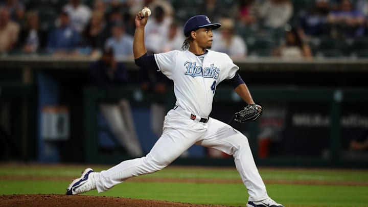 Hooks pitcher Miguel Ullola throws a pitch on Opening Night at Whataburger Field on Friday, April 5, 2024, in Corpus Christi, Texas. Hooks pitcher Miguel Ullola throws a pitch on Opening Night at Whataburger Field on Friday, April 5, 2024, in Corpus Christi, Texas.