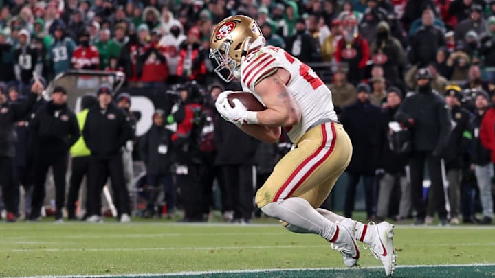 Jan 11, 2026; Philadelphia, PA, USA; San Francisco 49ers running back Christian McCaffrey (23) makes a catch for a touchdown against the Philadelphia Eagles during the fourth quarter in an NFC Wild Card Round game at Lincoln Financial Field. Mandatory Credit: Bill Streicher-Imagn Images