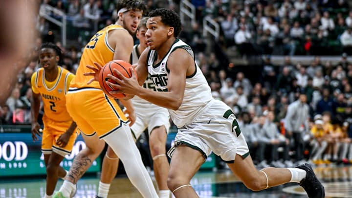 Michigan State's Divine Ugochukwu cuts to the basket on his way to a score against Toledo during the second half on Tuesday, Dec. 16, 2025, at the Breslin Center in East Lansing.