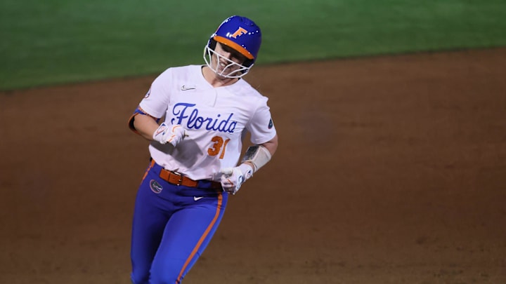 Florida infielder Kenleigh Cahalan (31) rounds second after her grand slam home run during a NCAA softball game at Katie Seashole Pressly Stadium in Gainesville, FL on Wednesday, February 11, 2026. Florida beat Jacksonville in their home opener 11-1, [Alan Youngblood/Gainesville Sun]