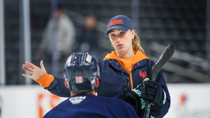 Coachella Valley Firebirds assistant coach Jessica Campbell talks to Firebirds forward Cameron Hughes (19) during practice at Acrisure Arena in Palm Desert, Calif., on Tuesday, May 28, 2024.