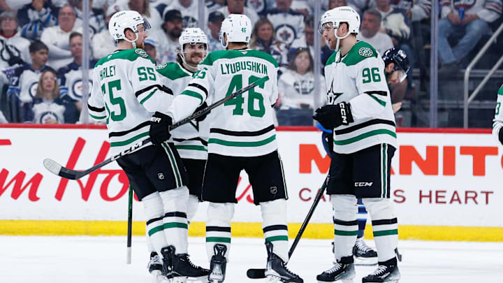 May 7, 2025; Winnipeg, Manitoba, CAN; Dallas Stars forward Mikko Rantanen (96) is congratulated by his team mates on his goal against the Winnipeg Jets during the second period in game one of the second round of the 2025 Stanley Cup Playoffs at Canada Life Centre. Mandatory Credit: Terrence Lee-Imagn Images