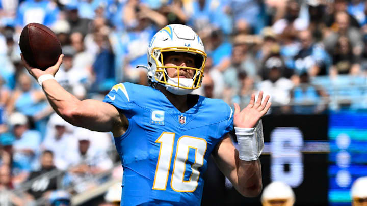 Sep 15, 2024; Charlotte, North Carolina, USA;  Los Angeles Chargers quarterback Justin Herbert (10) looks to pass in the second quarter at Bank of America Stadium. Mandatory Credit: Bob Donnan-Imagn Images