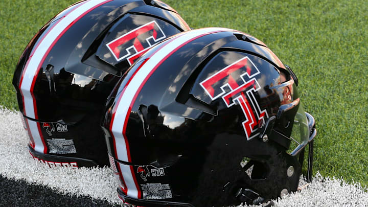 Sep 21, 2024; Lubbock, Texas, USA;  A general view of Texas Tech Red Raiders helmets on the turf before the game between the Arizona State Sun Devils and the Texas Tech Red Raiders at Jones AT&T Stadium and Cody Campbell Field. Mandatory Credit: Michael C. Johnson-Imagn Images
